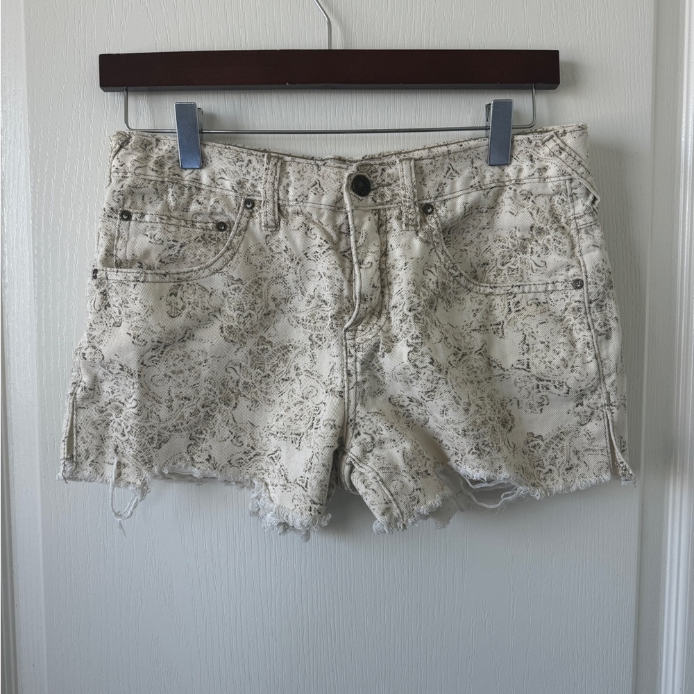 Free People floral print jean shorts